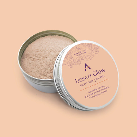 Desert Glow face mask powder for acne-prone skin with red clay, bamboo and geranium oil. Packaged in an eco-friendly aluminium tin.