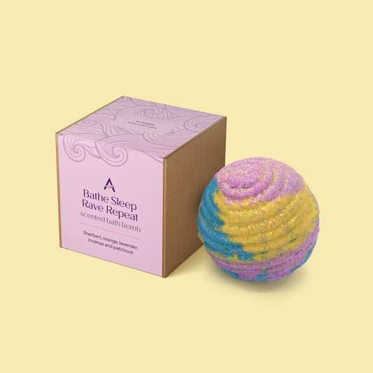 Bathe Sleep Rave Repeat festival-ins handmade bath bomb with bright colours and playful scent.