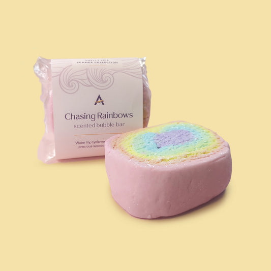 Handmade rainbow bubble bar with silver shimmer inspired by summer skies.