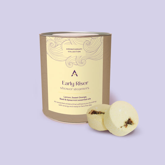 Early Riser shower steamers with orange, lemon, basil and spearmint essential oils for an energising morning aromatherapy experience.