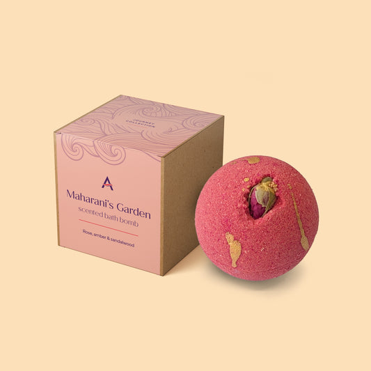 Rose and sandalwood bath bomb with dried rose bud inspired by Indian rose gardens