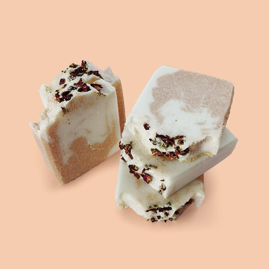 Collection of pink and white soap bars