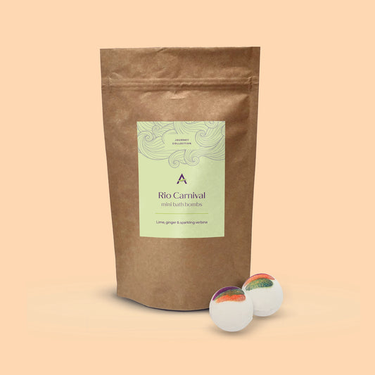 Pouch of mini Rio Carnival bath bombs in colourful citrus tones.