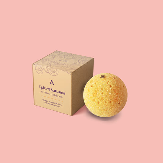 Handmade orange and clove bath bomb with festive spice fragrance