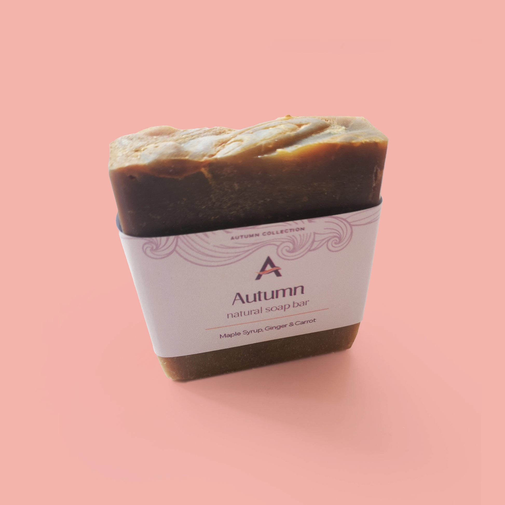 Maple, ginger and carrot natural soap bar with label
