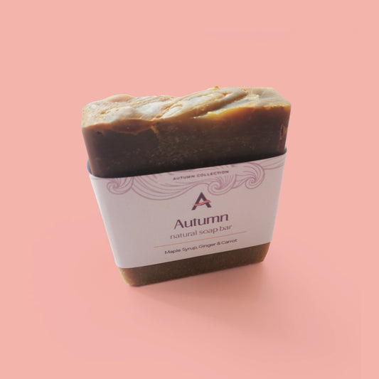Maple, ginger and carrot natural soap bar with label
