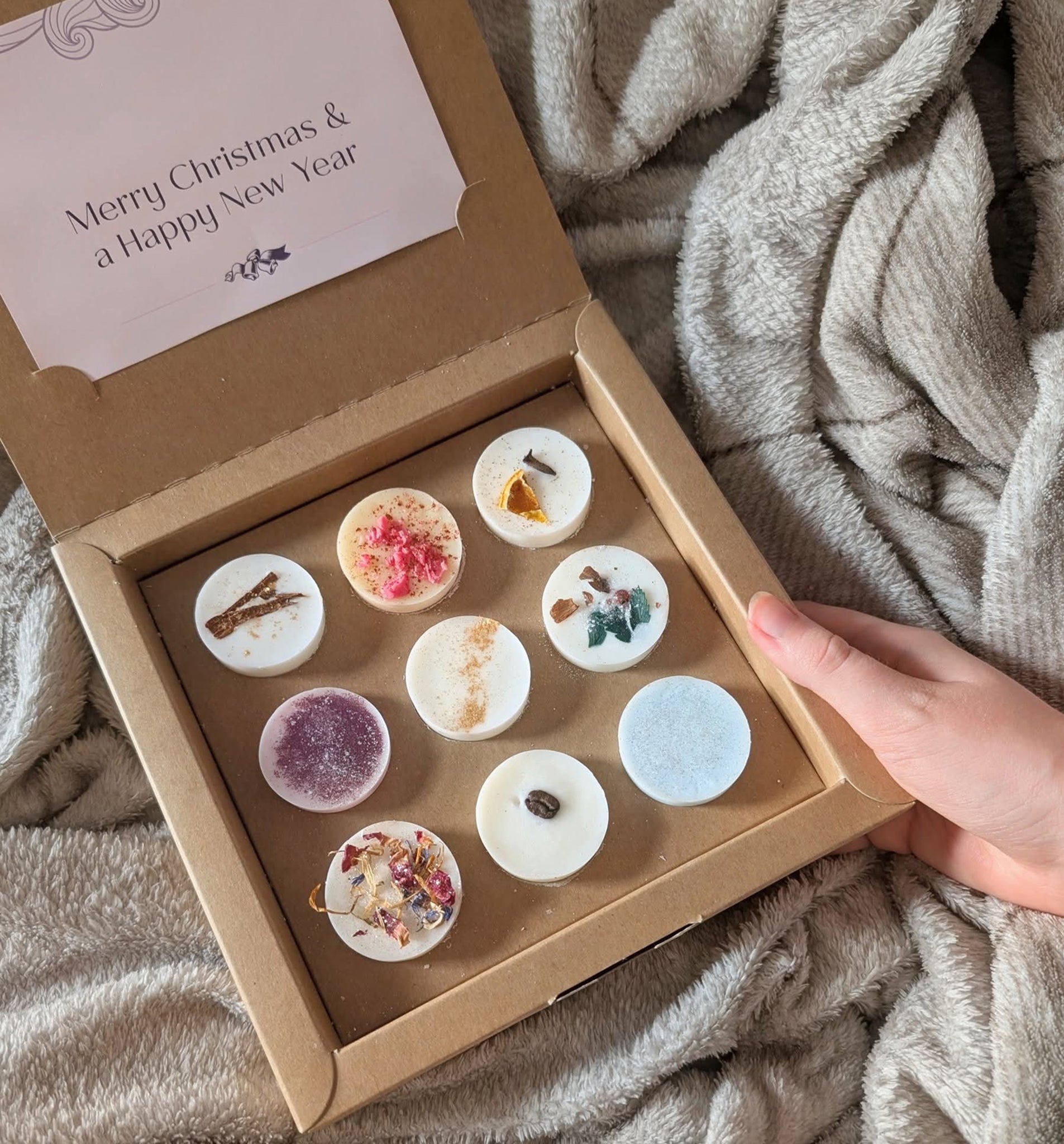 Gift box containing 9 wax melts in festive fragrances