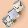 Set of three black and white soaps in a row 