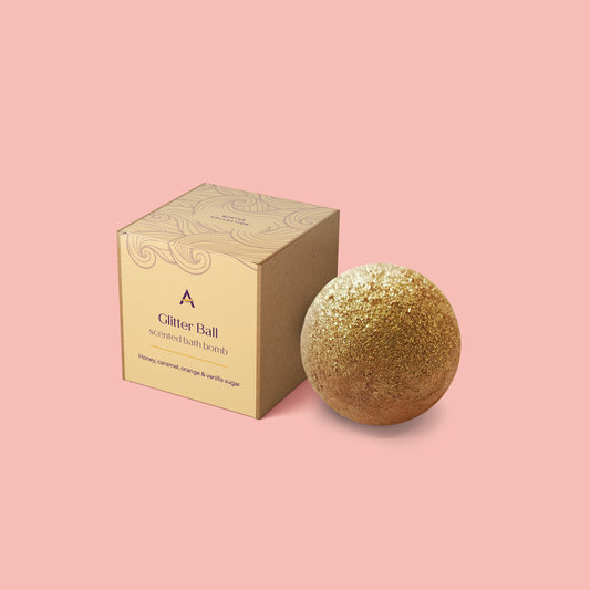 Handmade vegan gold bath bomb with honey and vanilla fragrance