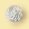 Close of Funfair fluffy body scrub with pastel swirls and silver shimmer