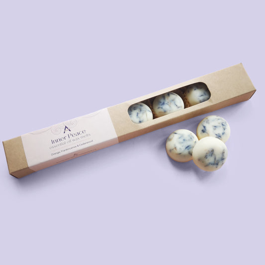 Inner Peace wax melts with orange, cedarwood and frankincense essential oils and dried cornflower petals