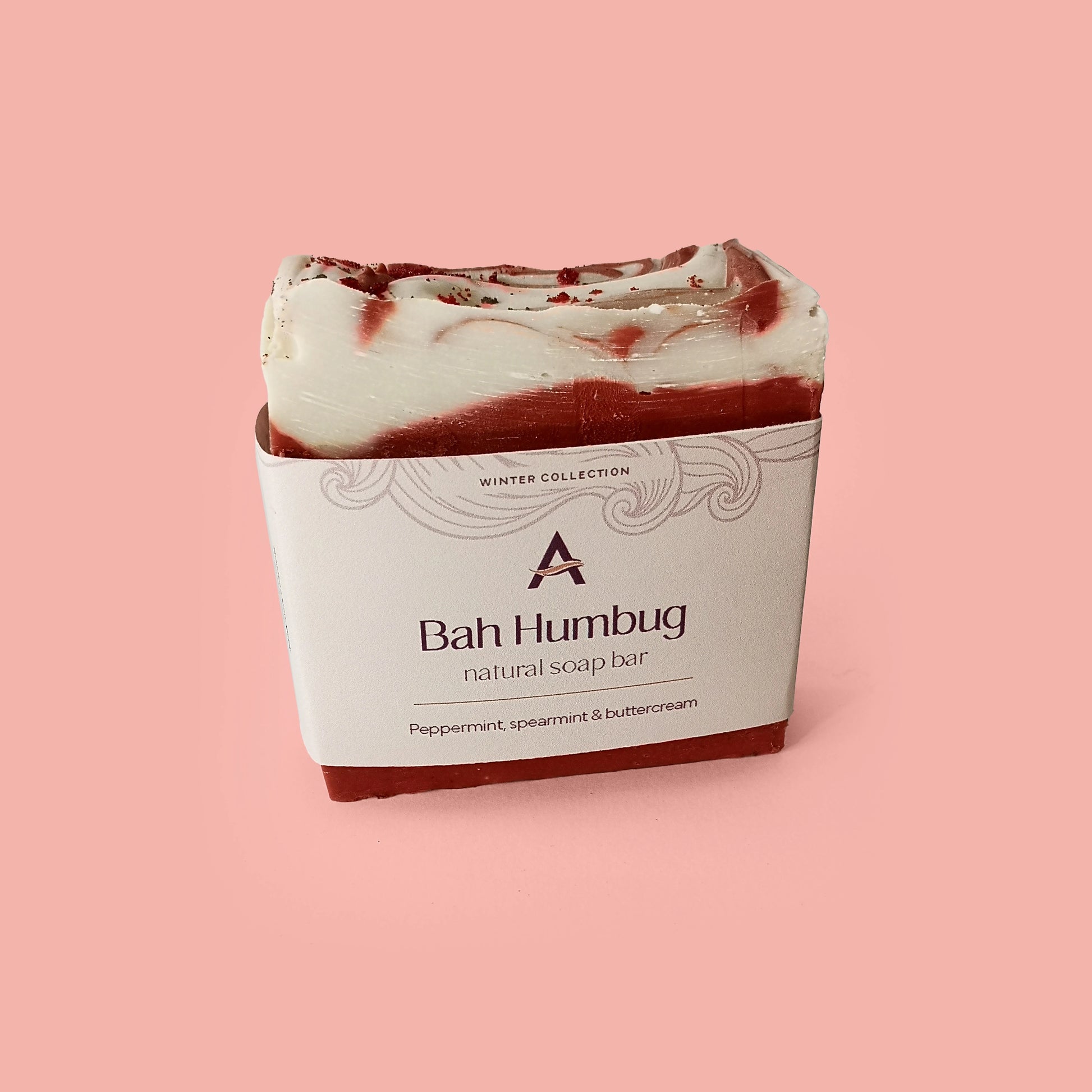 red and white striped soap bar with label