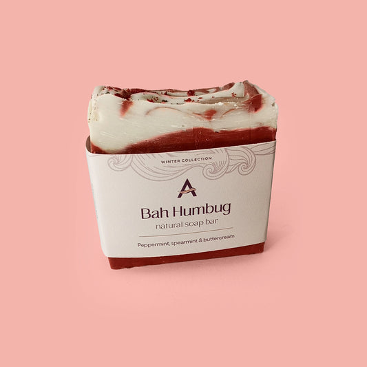 red and white striped soap bar with label
