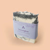 black and white soap bar with label