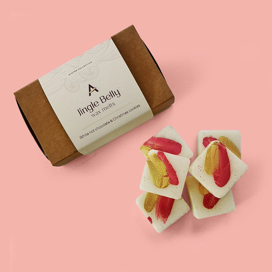 white, gold and red wax melt squares with box