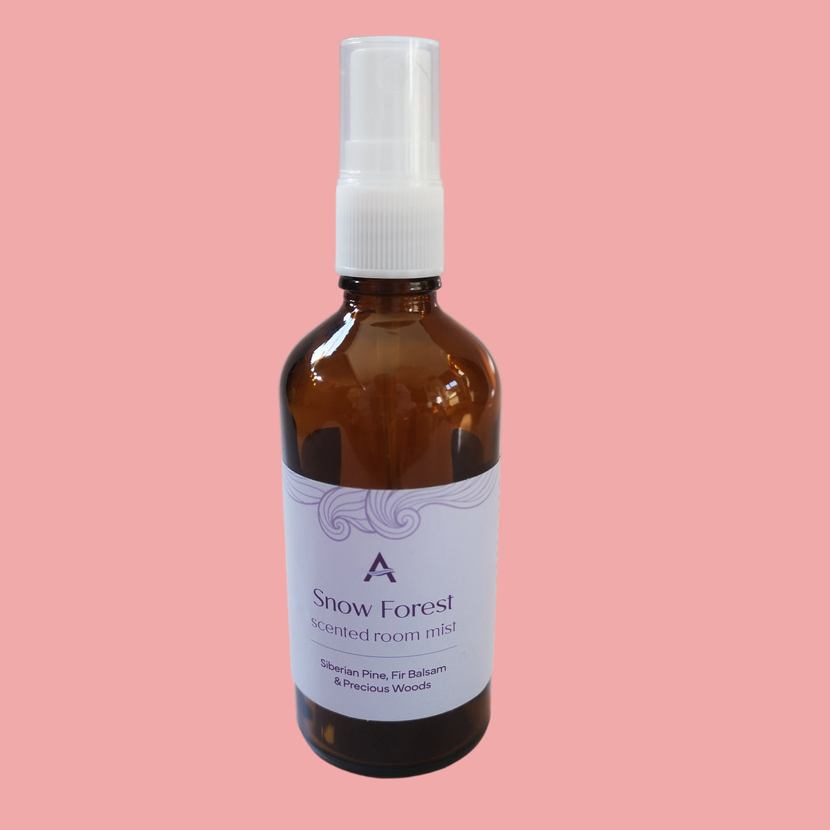 Siberian pine, fir balsam, & precious woods room mist in amber glass bottle.