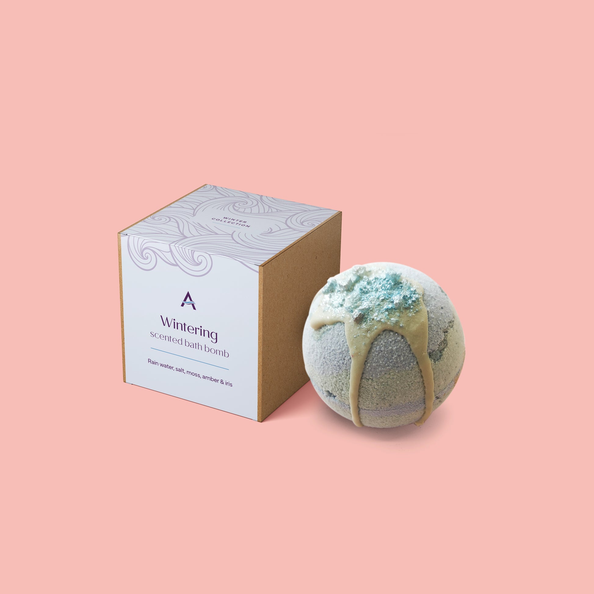 Wintering Bath Bomb pastel blue and teal with cocoa butter drizzle