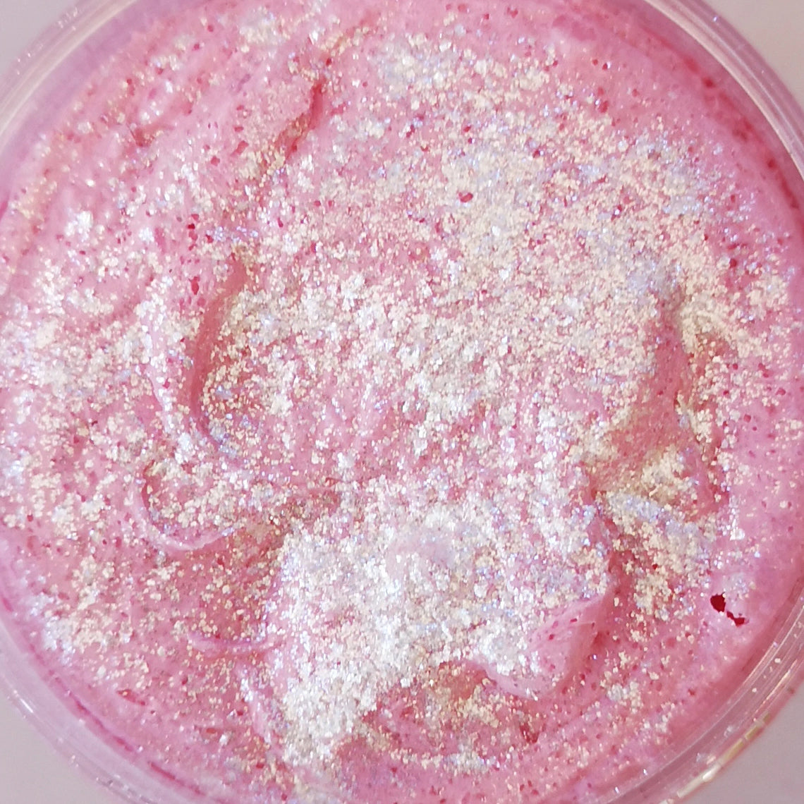Handmade exfoliating body polish with jojoba oil and sugar
